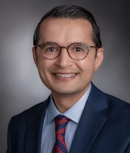Mutlay Sayan, MD Headshot